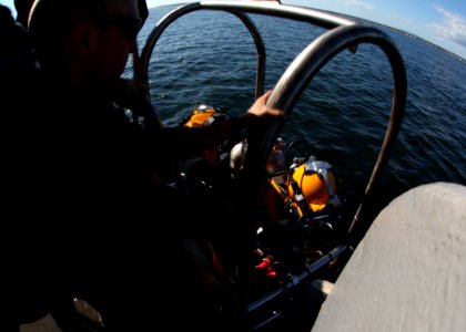 US Navy divers search for the remains of five unaccounted for service members from 1942 120728-N-OT964-166