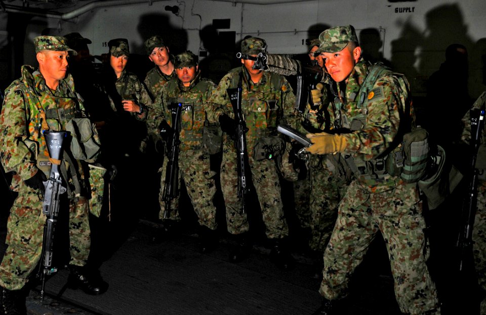 US Navy 120208-N-KB563-051 Members of the Japan Ground Self-Defense Force conduct small arms weapons training aboard the amphibious assault ship US