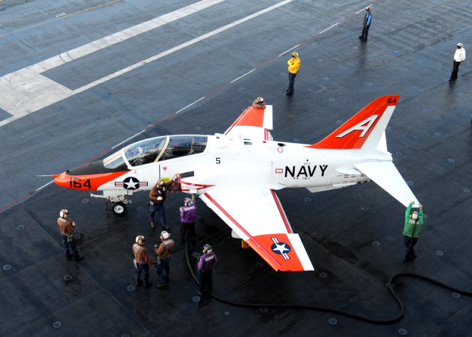 US Navy 120207-N-TU894-013 Sailors refuel a Goshawk on the flight deck of the USS George H.W. Bush