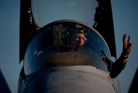US Navy 120207-N-DR144-659 Aviation Structural Mechanic (Equipment) 2nd Class Jack McMurrain, assigned to Strike Fighter Squadron (VFA) 113, signal