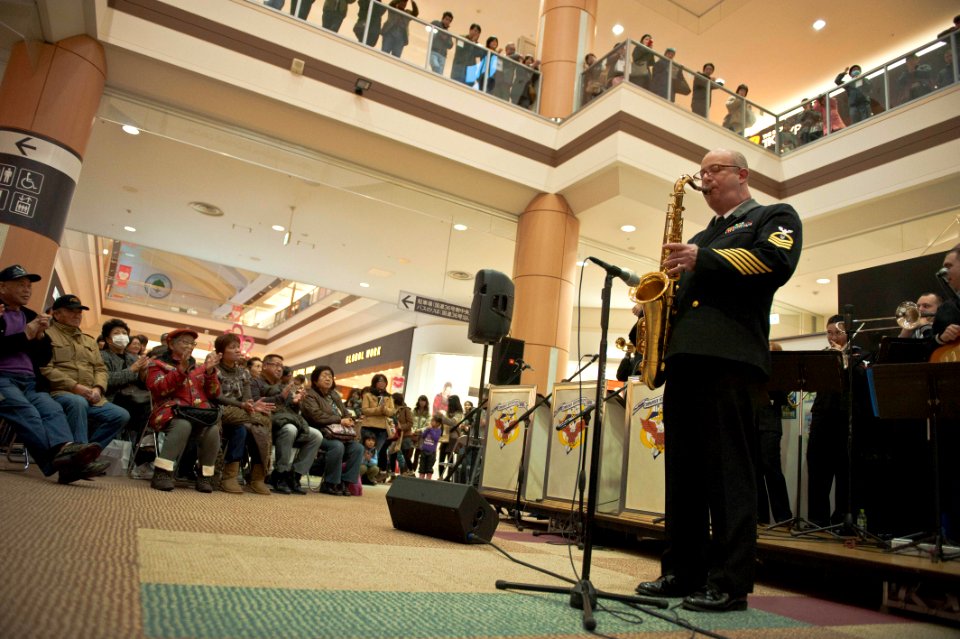 US Navy 120207-N-CZ945-293 Chief Musician Nicholas Flores, assigned to the U.S. 7th Fleet Band's Far East Edition, plays the saxophone during a per