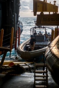 US Navy divers prepare to operate tow fish side scan sonar 150111-N-DC018-014