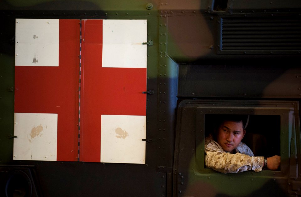 US Navy 120209-N-PB383-356 Hospital Corpsman 3rd Class Roel Espina prepares to embark a landing craft, air cushion