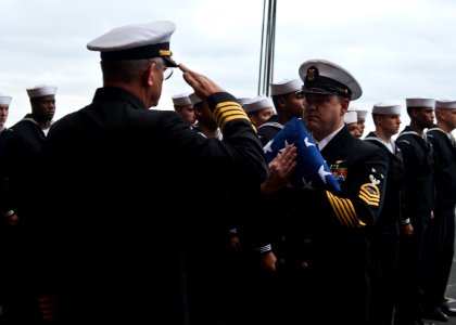 US Navy 120207-N-FI736-191 Sailors take part in a burial at sea ceremony