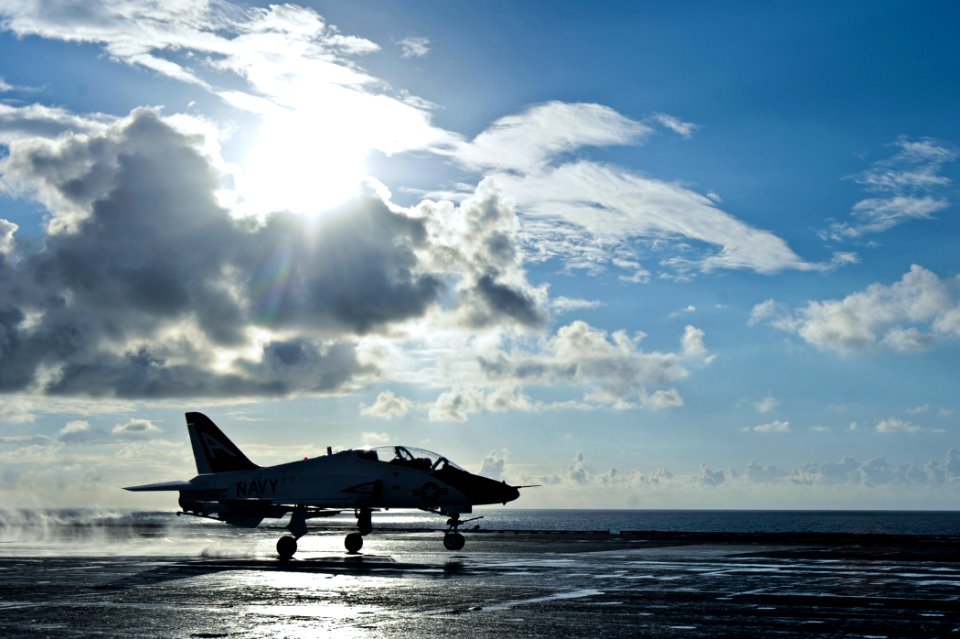 US Navy 120207-N-XE109-003 An aircraft performs a touch-and-go on the flight deck