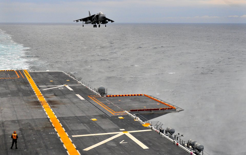 US Navy 120207-N-KB563-130 An AV-8B Harrier approaches the flight deck of the amphibious assault ship USS Peleliu (LHA 5) during flight operations