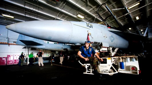 US Navy 120208-N-OY799-424 Aviation Boatswain's Mate (Handling) Airman Jose Morales, from Santa Isabel, Puerto Rico, moves an F-A-18F Super Hornet