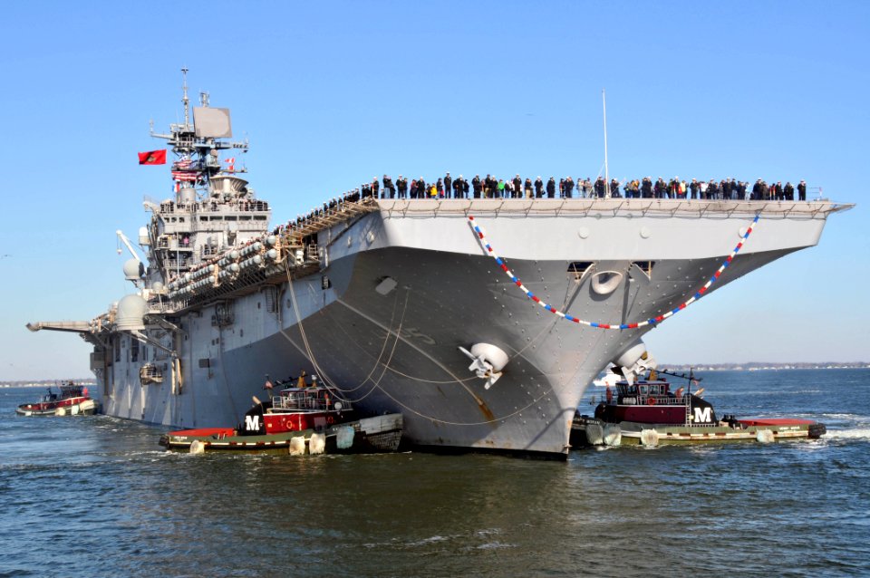 US Navy 120207-N-QY430-052 The amphibious assault ship USS Bataan (LHD 5) pulls into Naval Station Norfolk after completing a 10 1-2-month deployme