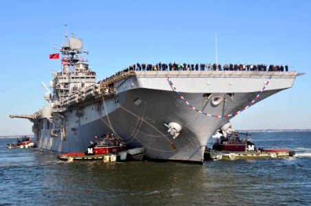 US Navy 120207-N-QY430-052 The amphibious assault ship USS Bataan (LHD 5) pulls into Naval Station Norfolk after completing a 10 1-2-month deployme