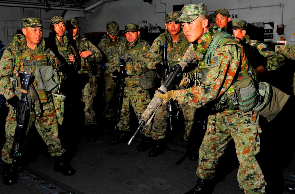 US Navy 120208-N-KB563-104 Members of the Japan Ground Self-Defense Force conduct small arms weapons training aboard the amphibious assault ship US