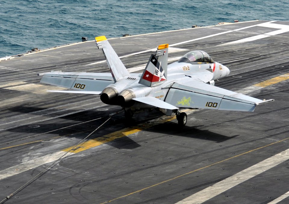 US Navy 120209-N-YB753-103 An F-A-18F Super Hornet assigned to the Bounty Hunters of Strike Fighter Squadron (VFA) 2 traps an arresting wire on the