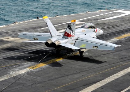 US Navy 120209-N-YB753-103 An F-A-18F Super Hornet assigned to the Bounty Hunters of Strike Fighter Squadron (VFA) 2 traps an arresting wire on the