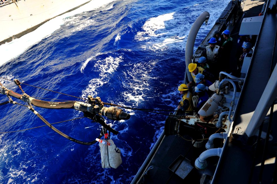 US Navy 120212-N-ED900-671 Sailors aboard the guided-missile destroyer USS Pinckney (DDG 91) wait for the fueling probe to reach station during a r