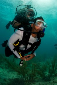 US Navy divers and Belizean Coast Guard divers work together during Southern Partnership Station '14 140613-N-IP743-126