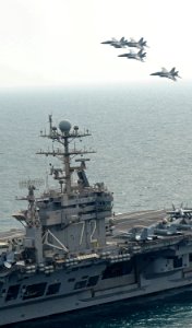 US Navy 120209-N-VO377-346 F-A-18F Super Hornets assigned to the Bounty Hunters of Strike Fighter Squadron (VFA) 2 fly in formation above the Nimit