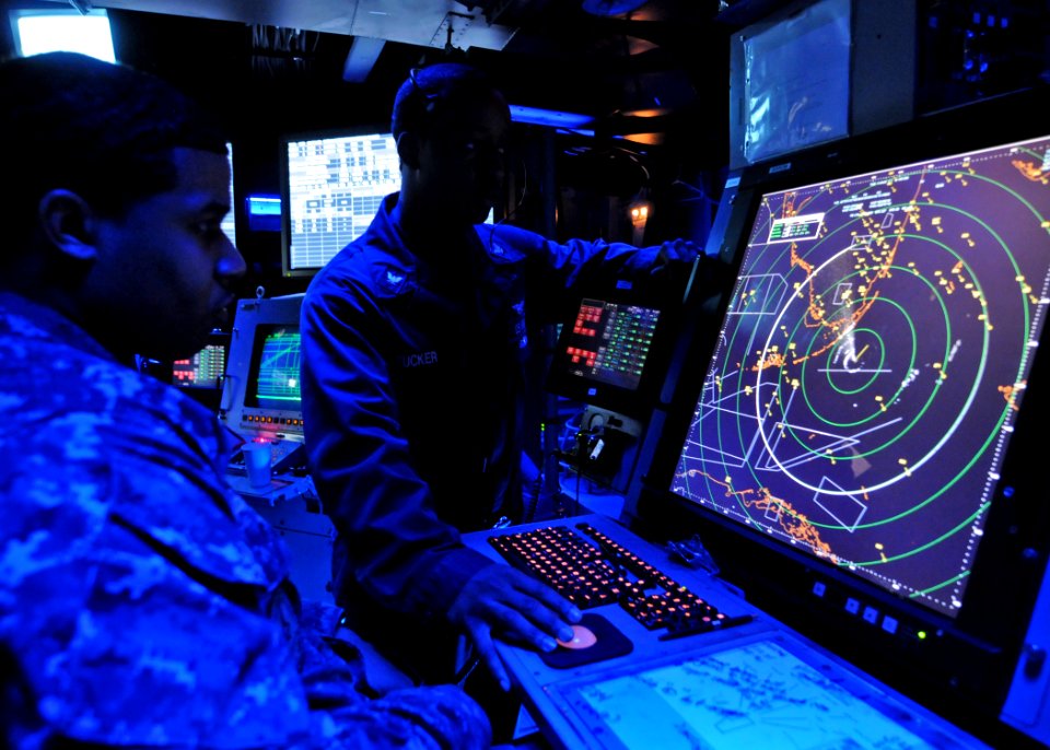 US Navy 120208-N-TU894-022 Air-Traffic Controller 2nd Class Gregory Clemmons stands the departure position watch as Air-Traffic Controller 3rd Clas