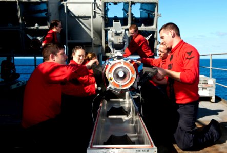 US Navy 120214-N-VH839-014 Sailors aboard the Nimitz-class aircraft carrier USS John C. Stennis (CVN 74) remove a RIM-7 Sea Sparrow missile from a