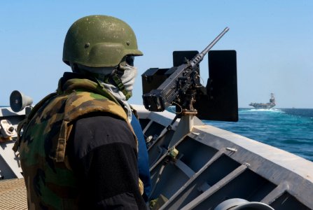 US Navy 120214-N-VY256-063 A Sailor mans a small craft attack team post aboard the Ticonderoga-class guided-missile cruiser USS Cape St. George (CG