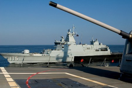 US Navy 120210-N-ZZ999-044 The Royal Malaysian Navy offshore patrol vessel KD Kelantan (175) is underway alongside the guided-missile destroyer USS