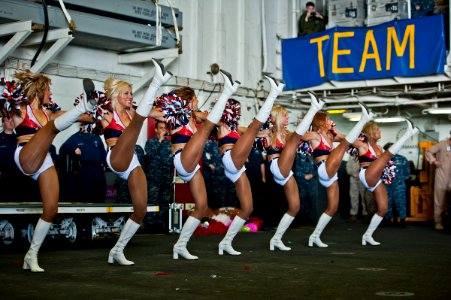US Navy 120213-N-DX615-530 Seattle Seahawks cheerleaders, the Sea Gals, perform a dance routine for Sailors and Marines aboard the amphibious assau