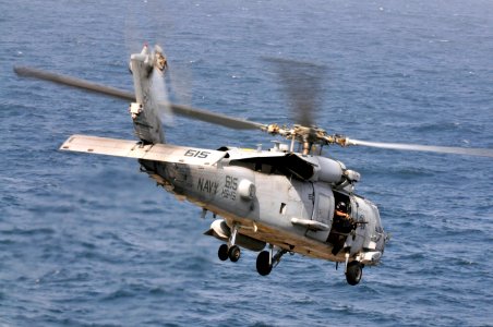 US Navy 120213-N-ZI635-048 An HH-60H Sea Hawk helicopter assigned to Helicopter Anti-Submarine Squadron (HS) 15 launches from the Nimitz-class airc