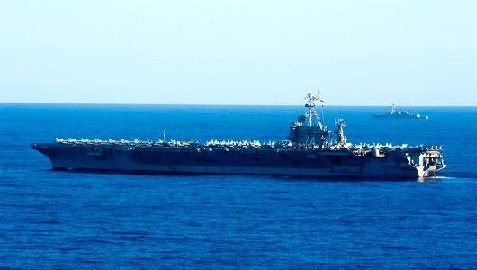 US Navy 120214-N-OY799-100 The Nimitz-class aircraft carrier USS John C. Stennis (CVN 74) and the Arleigh Burke-class guided-missile destroyer USS