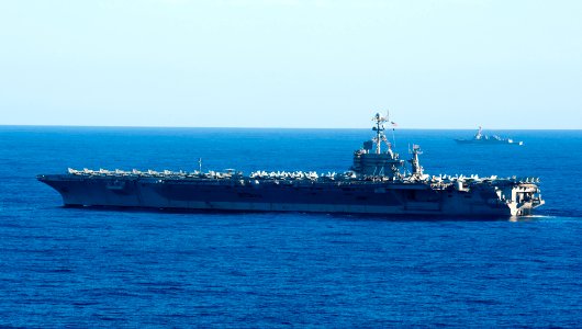 US Navy 120214-N-OY799-100 The Nimitz-class aircraft carrier USS John C. Stennis (CVN 74) and the Arleigh Burke-class guided-missile destroyer USS photo