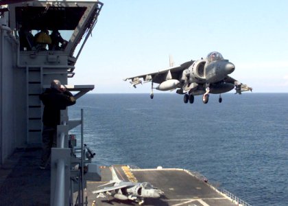 US Navy 990414-N-6240R-513 he Air Boss watches as the last AV-8B