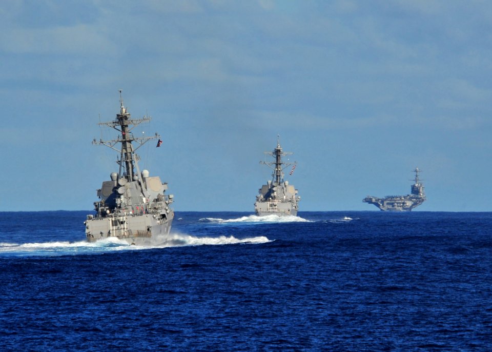 US Navy 120212-N-ED900-386 The Nimitz-class aircraft carrier USS John C. Stennis (CVN 74), the Arleigh Burke-class guided-missile destroyer USS Kid