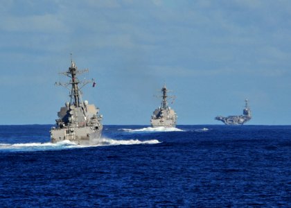 US Navy 120212-N-ED900-386 The Nimitz-class aircraft carrier USS John C. Stennis (CVN 74), the Arleigh Burke-class guided-missile destroyer USS Kid
