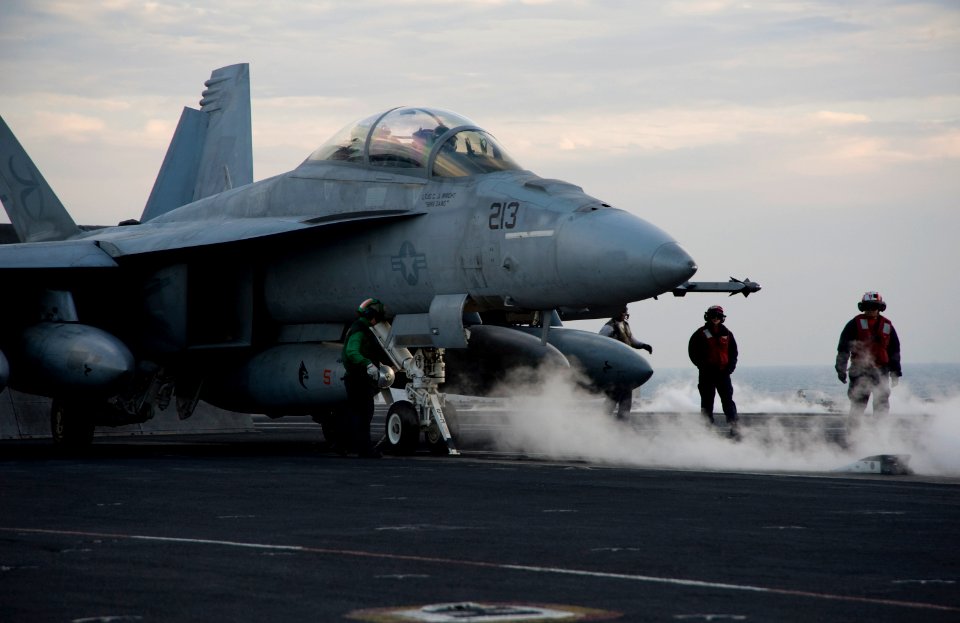 US Navy 120213-N-JN664-180 Sailors assigned to the Kestrels of Strike Fighter Squadron (VFA) 137 prepare an F-A-18E Super Hornet for launch on the
