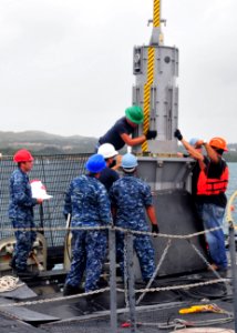 US Navy 120213-N-BK435-106 Sailors assigned to both the submarine tender USS Emory S. Land (AS 39) and USS Frank Cable (AS 40) conduct Tomahawk lan