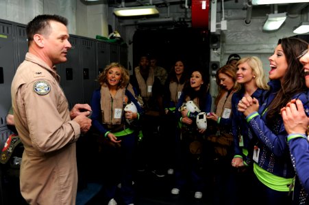 US Navy 120213-N-KD852-014 Capt. Jim Landers, commanding officer of the amphibious assault ship USS Makin Island (LHD 8), greets Seattle Seahawks c