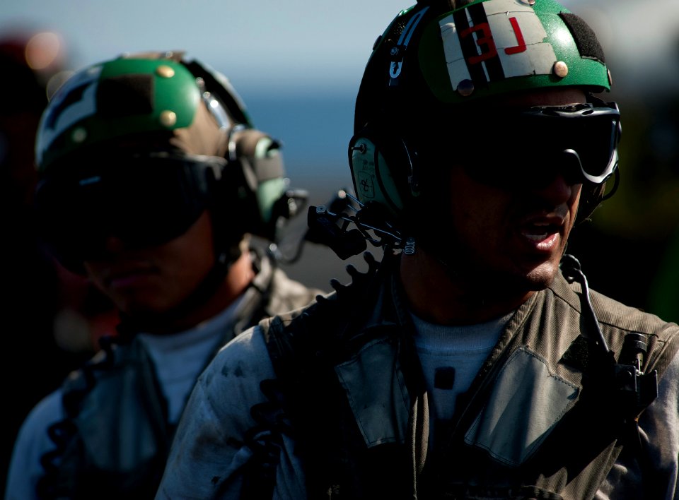 US Navy 120215-N-DR144-353 Sailors work on the flight deck of the Nimitz-class aircraft carrier USS Carl Vinson (CVN 70)