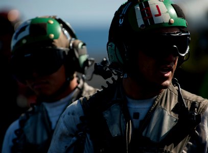 US Navy 120215-N-DR144-353 Sailors work on the flight deck of the Nimitz-class aircraft carrier USS Carl Vinson (CVN 70) photo