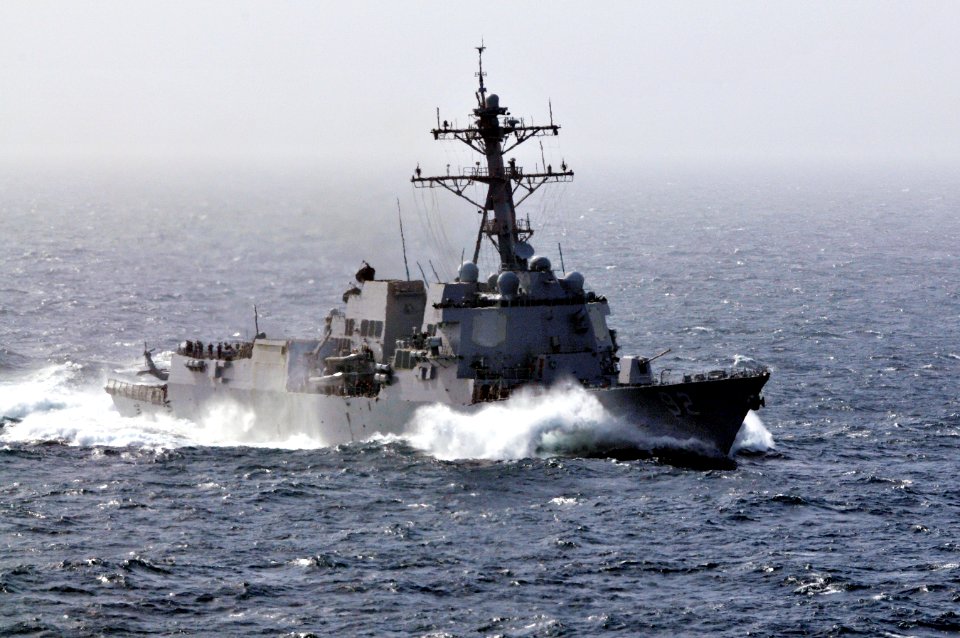 US Navy 120213-N-ZI635-406 The Arleigh Burke-class guided-missile destroyer USS Momsen (DDG 92) pulls alongside the Nimitz-class aircraft carrier U