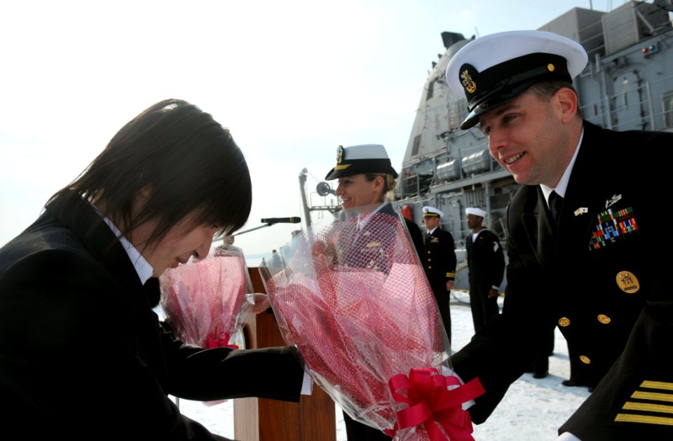 US Navy 120214-N-MU720-009 Lt. Cmdr. Suzanne Schang, commanding officer of the mine countermeasure ship USS Patriot (MCM 7) and Command Master Chie