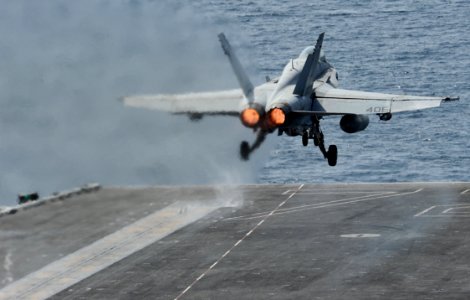 US Navy 120216-N-VO377-361 An F-A-18C Hornet assigned to the Blue Blasters of Strike Fighter Squadron (VFA) 34 launches from the flight deck of the