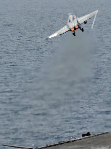 US Navy 120216-N-VO377-380 An F-A-18C Hornet assigned to the Blue Blasters of Strike Fighter Squadron (VFA) 34 launches from the flight deck of the