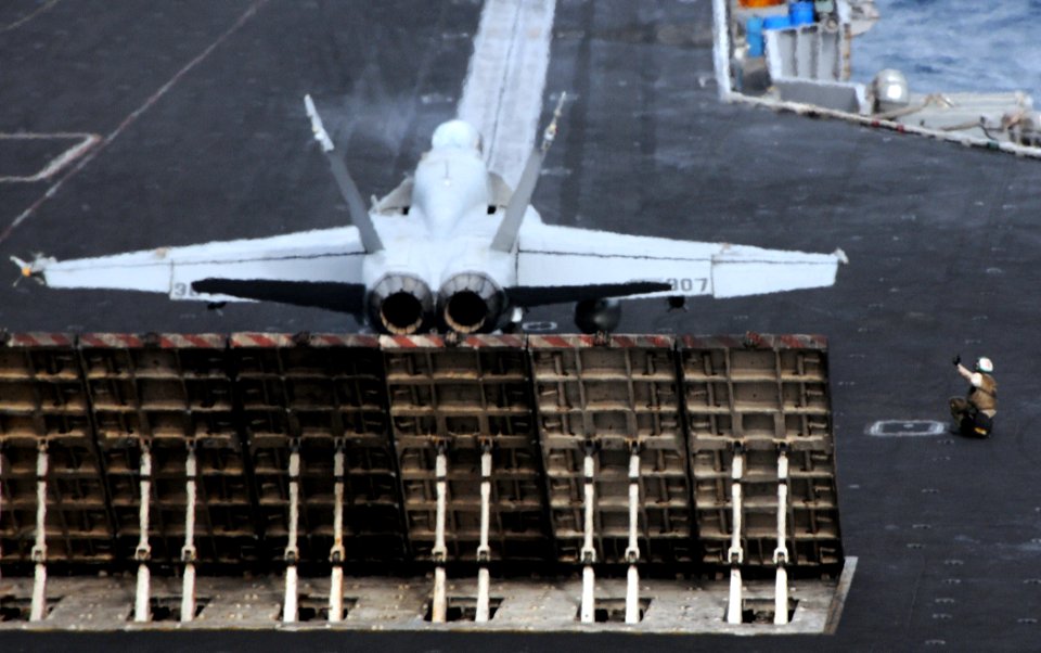 US Navy http-www.navy.mil-management-photodb-photos-100603-N-4236E-018 An F-A-18C Hornet prepares to catapult from USS Dwight D. Eisenhower (CVN 69)