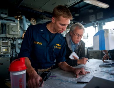 US Navy 120214-N-VY256-086 Lt. j.g. James Dawson, a navigation officer aboard the Ticonderoga-class guided-missile cruiser USS Cape St. George (CG photo