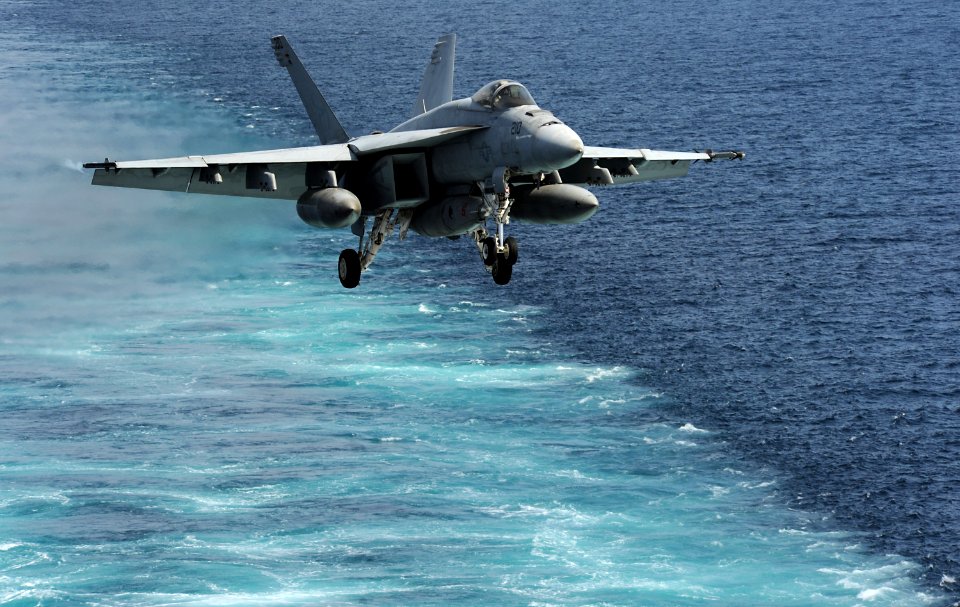 US Navy 120216-N-VO377-442 An F-A-18E Super Hornet assigned to the Kestrels of Strike Fighter Squadron (VFA) 137 approaches the flight deck of the
