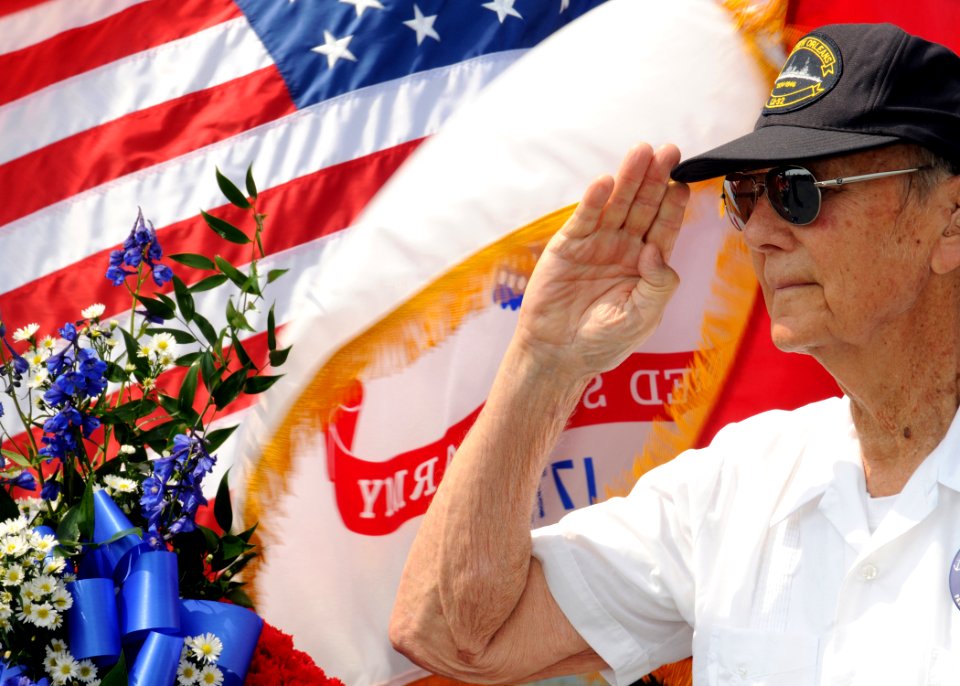 US Navy http-www.navy.mil-management-photodb-photos-100604-N-6509M-045 William Eckel, a veteran of the Battle of Midway, renders honors during a wreath presentation ceremony