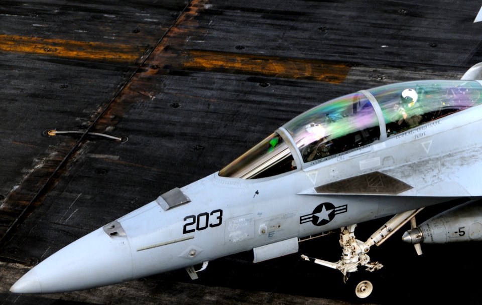 US Navy http-www.navy.mil-management-photodb-photos-100603-N-4236E-138 An F-A-18F Super Hornet taxis across the flight deck aboard USS Dwight D. Eisenhower (CVN 69)