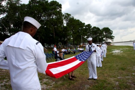 US Navy http-www.navy.mil-management-photodb-photos-100603-N-6936D-150 Sailors fold an American flag during the Naval Support Activity Panama City Battle of Midway remembrance ceremony
