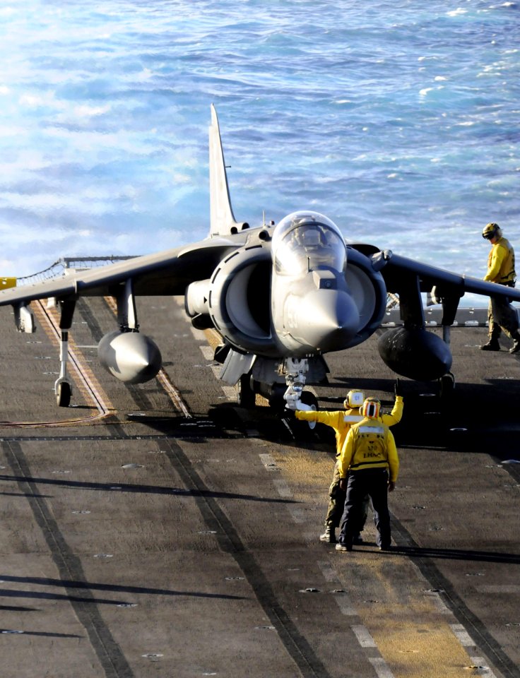 US Navy http-www.navy.mil-management-photodb-photos-100602-N-7948R-208 Sailors prepare to launch an AV-8B Harrier during flight operations aboard the amphibious assault ship USS Peleliu (LHA 5)