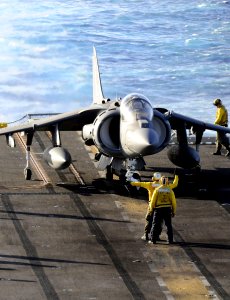 US Navy http-www.navy.mil-management-photodb-photos-100602-N-7948R-208 Sailors prepare to launch an AV-8B Harrier during flight operations aboard the amphibious assault ship USS Peleliu (LHA 5)
