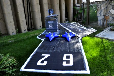 US Navy Sailors make aircraft carrier in Kabul, Afghanistan celebrate US Independence Day at Resolute Support Headquarters 150704-N-SQ656-768