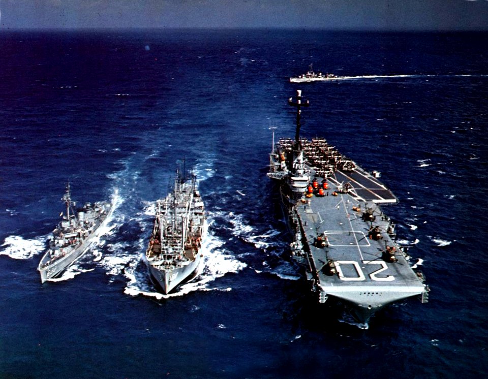USS Bennington (CVS-20) and USS Braine (DD-630) during an underway replenishment in the Pacific Ocean, circa in 1960