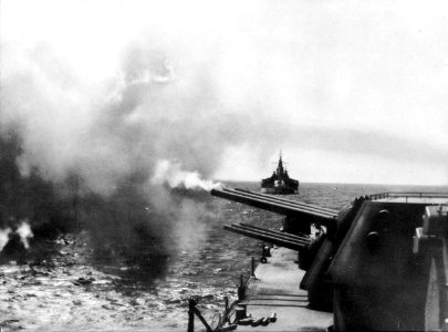 USS Biloxi (CL-80) shelling Okinawa in 1945 photo